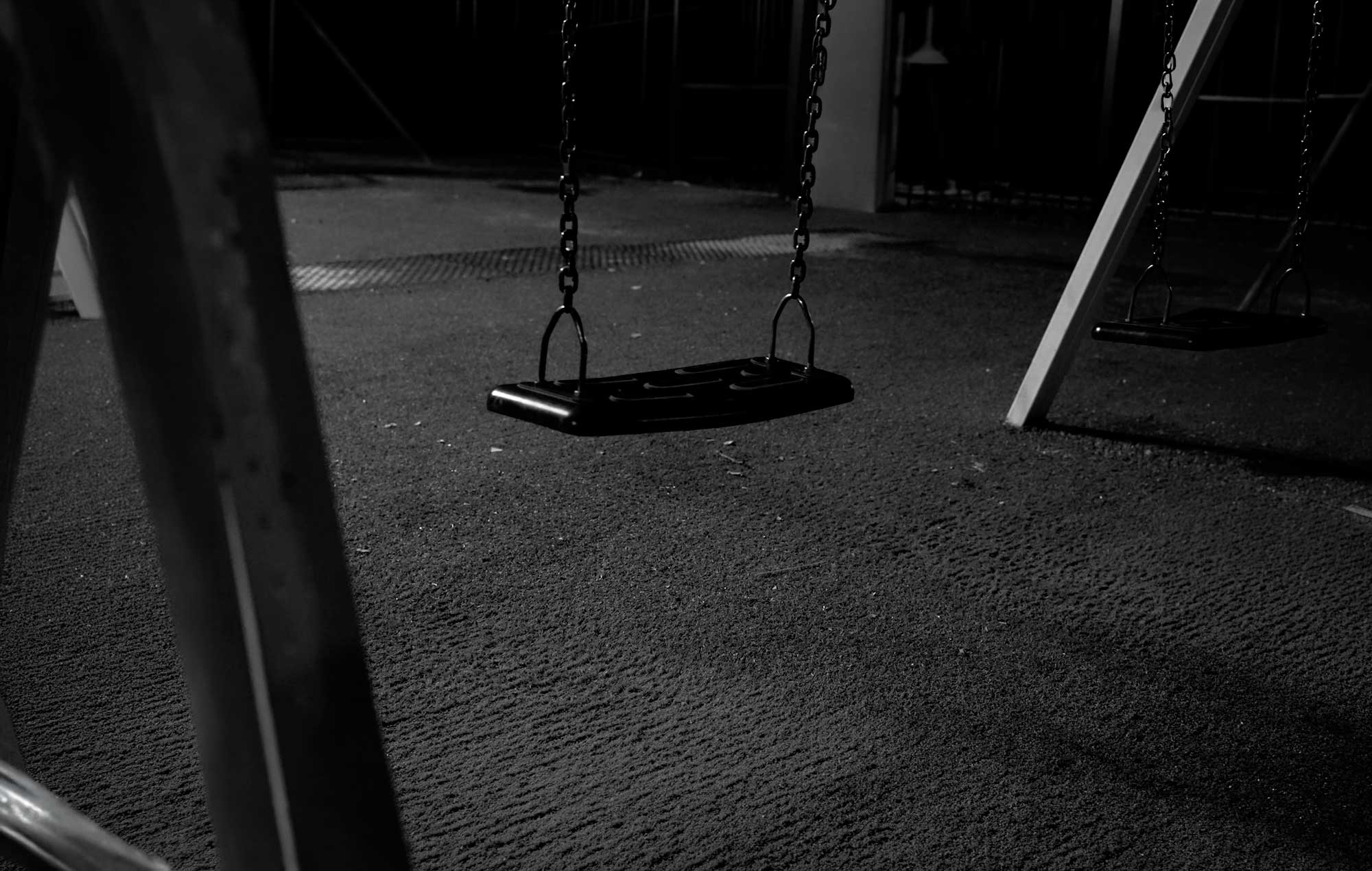 Empty swings at night